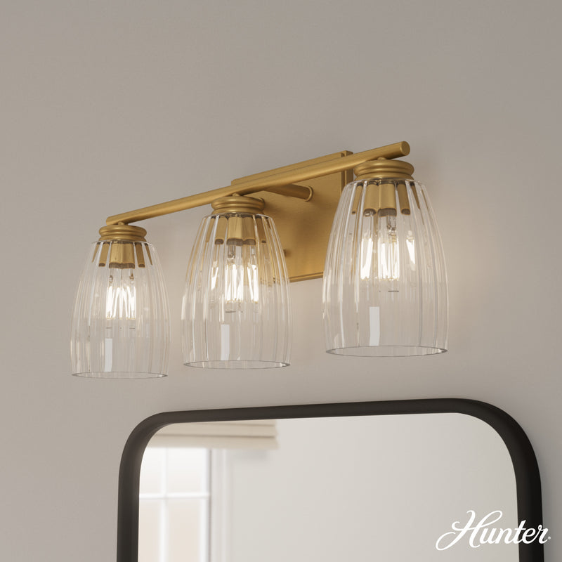 Hunter Rossmoor Luxe Gold with Clear Glass 3 Light Bathroom Vanity Wall Light Fixture - Jasmine Roth Collection